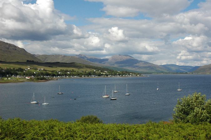 A panoramic view of Loch Carron and Lochcarron village as seen from the top of Slumbay Island
